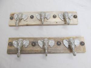 lot 103 image: Elephant coat hangers