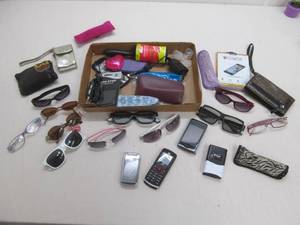 lot 162 image: Sunglasses, tazor, cell phones, purse, and more