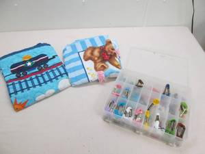 lot 188 image: Thread, storage containers, baby quilts