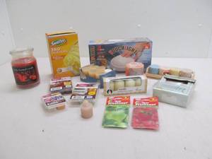 lot 287 image: Swifter dusters, lights, candles, wax