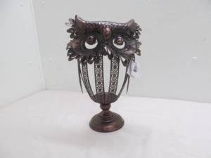 lot 304 image: Metal owl candle  dcor