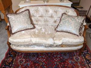 lot 237 image: Vintage Tufted Wood Loveseat with Pillows