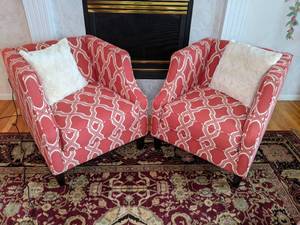 lot 25 image: Two Coral Accent Chairs with Matching Pillows