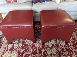 lot 32 image: Pair of Red Belham Living Hutton Arched Cube Nailhead Ottomans