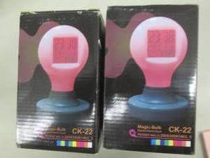 2 Magic Bulb Digital Alarm Clocks...