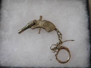 lot 47 image: Smallest Working Cap Gun - 2 in case