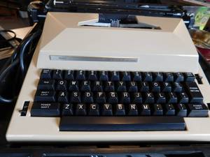 lot 281 image: Typewriter, VHS Recorder, Projector Screen