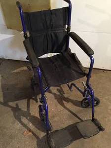 lot 39 image: Invacare Lightweight Transport Wheel Chair
