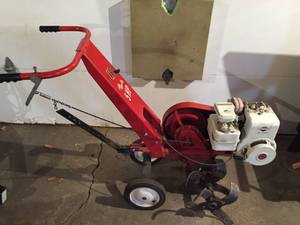 lot 1 image: Briggs & Stratton 5 HP Front Tine Tiller