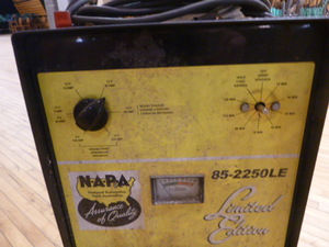 lot 13 image: NAPA Battery Charger and Starter