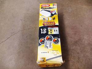 lot 280 image: Never used Genie DuraDrive Diamond Edition 12 HP Screw Drive Garage Door Opener