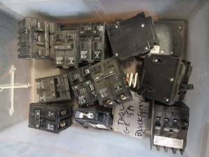 lot 879 image: BIN OF MISCELLANEOUS BREAKERS - CONTRACTOR RETURNS