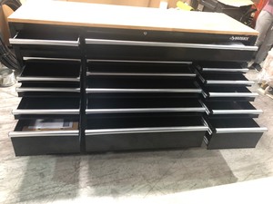 lot 42 image: 72 in. 18-Drawer Mobile Workbench with Solid Wood Top, Black by Husky not used whit scratches and dents please review the pictures