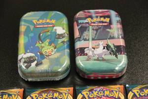 Pokemon Unopened Packs and Tin Lot
