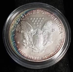 1992 AMERICAN SILVER EAGLE 1 TROY OZ. .999 FINE SILVER IN AIRTITE RICH TONING