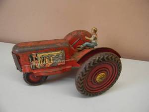 lot 44 image: VINTAGE 1940s-50s MARX FARMALL TRACTOR WFARMER TIN TOY - AWESOME PIECE - LARGE APPROX 12 BY 8 BY 9 - SEE PICTURES