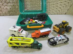 Assorted Toy CarsTrucks in Case  C...