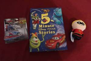 lot 66 image: Disney Pixar Lot - Hardback Book, Itty Bittys Plush and Sealed Cars Car