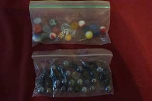 lot 96 image: 2 Small Bags of Marbles