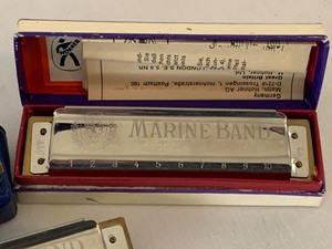 lot 209 image: Four Harmonicas