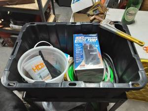 lot 10 image: 14 Hp. Submersible Pump, Hoses, Pipe Wrench & Tote With Lid