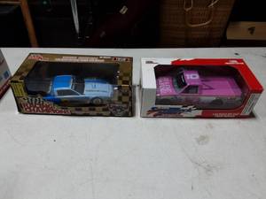 lot 16 image: 2-Racing Champions Racing Cars