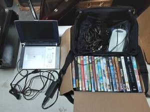 lot 30 image: Portable DVD Player & Assorted Kids DVDs