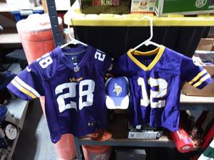 lot 41 image: 2-Youth Size 8 MN Vikings Jerseys & Cap
