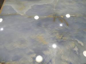 lot 108 image: Lumina Caspian Onyx 24x48 Polished Porcelain Tile LOT OF 5 TILES.