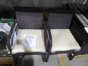lot 83 image: Corsica Multi-brown Wicker Outdoor Dining Chairs with Cream Cushions (Set of 2)