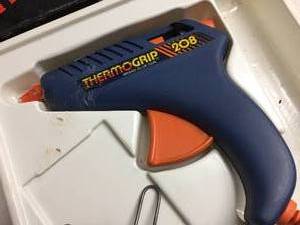 lot 196 image: Thermo Grip Glue Gun 208 With Glue Sticks