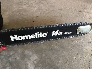 lot 301 image: Homelite 14 Inch Electric Chainsaw