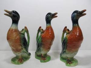 lot 22 image: 3 Vintage Signed French ST. CLEMENT Majolica Duck Pitchers
