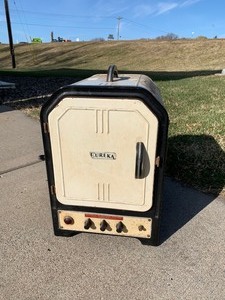 lot 103 image: Vintage Enameled EUREKA Electric Camp Stove