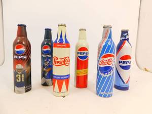 lot 117 image: 6 Unopened Aluminum 16oz Pepsi Collectible Bottles