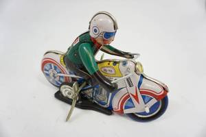 lot 129 image: Vintage Windup Motorcycle Toy MS-702