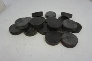 lot 247 image: 18 Hockey Pucks