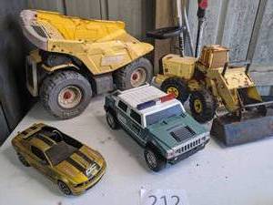 lot 212 image: (3) Tonka Trucks and (1) Ford Mustang