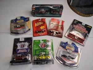 lot 17 image: Assorted Diecast Cars in Original Packaging - Maisto, Jada Toys, Castline