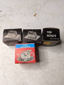 lot 59 image: Four Stainless Steel Tea Infusers - New in Box