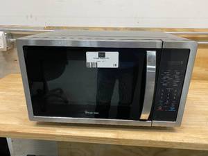 lot 16 image: MAGIC CHEF 1.6 cu. ft. Countertop Microwave in Stainless steel with Gray Cavity