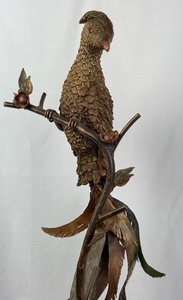 Tall Metal Bird on Branch