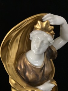 Porcelain Figure in Gold Crown and Robe