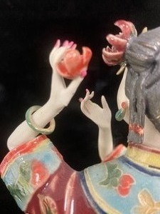 Young Asian Girl Figurine Sitting on Rock
