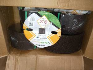 lot 21 image: Dark Brown Four 8 ft. Rolls Earth Rubber Edging 2( 5x8) & 2( 5x5) - never used