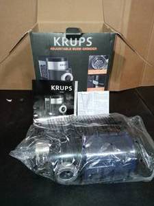 lot 27 image: 8 oz. Black Stainless Steel Burr Coffee Grinder with Adjustable Settings by Krups- never used