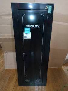 lot 48 image: 8-Gun 6 cu. ft. Key Lock Security Cabinet by Stack-On- never used slightly damaged