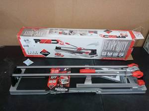 lot 57 image: 28 in. Speed-N Tile Cutter by Rubi- open box never used