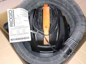 lot 66 image: 12 Gal. 5.0-Peak HP NXT WetDry Shop Vacuum with Filter, Hose and Accessories by RIDGID- used