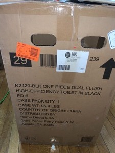 lot 98 image: 1-Piece 1.1 GPF1.6 GPF High Efficiency Dual Flush Elongated All-in-One Toilet in Black by Glacier Bay